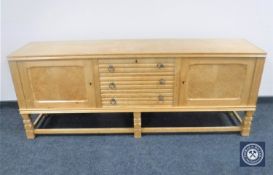 A blond oak low sideboard