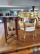 A small gilt console table and a mahogany occasional table