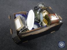 A box of Art Nouveau style photo frames, blue and white china,