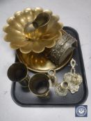 A tray of Eastern brass dish, ammunition shells,