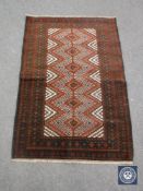 An old baluchi rug 128 cm x 88 cm