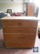 A pine four drawer chest
