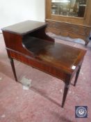 A mahogany telephone table