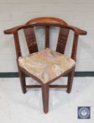 A continental oak corner chair