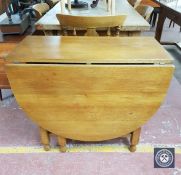 An oak gate leg table