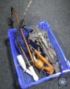 A crate containing various pipes,