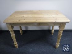 A pine farmhouse kitchen table