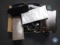 A box of assorted lady's handbags