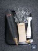 A tray of inert shells, boxed army spanners,