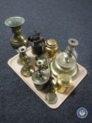 A tray of brass candlesticks, vintage blow lamp,