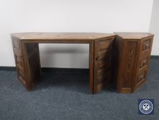 A reclaimed pine kneehole desk fitted two cupboards,
