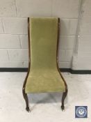 A Victorian mahogany nursing chair