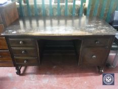An oak twin pedestal desk