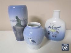 A Royal Copenhagen vase depicting a nude lady on a rock, height 17cm,