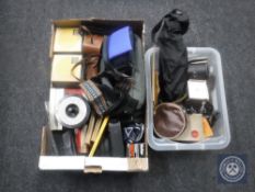 Two boxes of cameras,