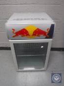 A bench top Red Bull bottle chiller