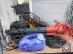 A Challenge electric lawn mower together with a Sovereign garden vacuum and a Draper pressure