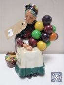 A Royal Doulton figure - The Old Balloon Seller HN 1315