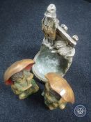 A pair of early 20th century chalk figures of a boy and girl with umbrella,