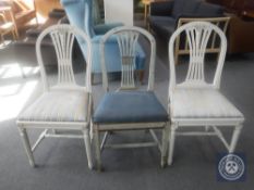 A pair of dining chairs together with an antique painted dining chair