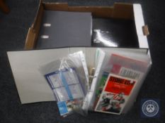 Four binders containing a very large quantity of 1960's and later football programmes,