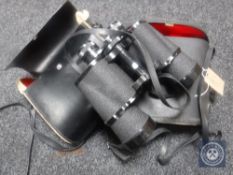 Two pairs of cased binoculars