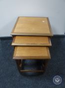 A nest of three 20th century teak G-Plan tables