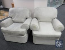 A pair of Marks & Spencers armchairs upholstered in a beige fabric