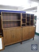A pair of mid 20th century Danish double door office cupboards fitted shelves above