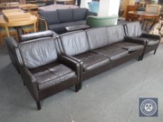 A 20th century Danish brown leather three-piece suite