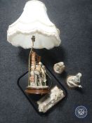 A tray of Italian figural table lamp of a figure at a well together with three other Italian