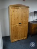 A pine double door wardrobe