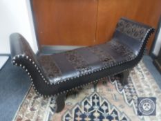 An embossed leather window seat