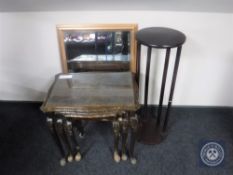 A nest of three figured walnut glass topped tables together with a plant stand and a gilt framed