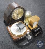 A tray of oak cased mantel clock, Huara clock under shade, brass battery operated carriage clock,