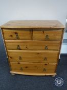 A pine five drawer chest