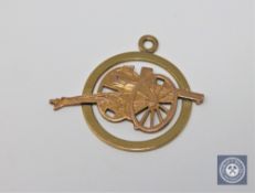 An 18ct gold French artillery pendant