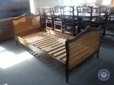 A continental walnut and bergere 3' bed frame