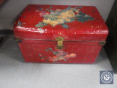 An early 20th century hand painted tin trunk