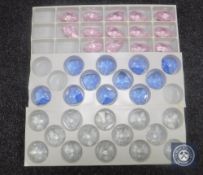 Three trays of Swarovski glass pendants