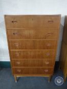 A mid 20th century teak six drawer chest