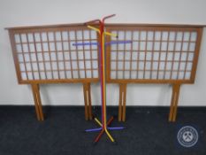 A pair of pine headboards and a hat and coat stand