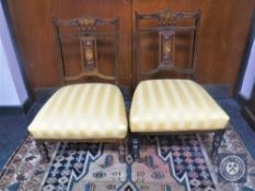 A pair of Victorian inlaid rosewood bedroom chairs