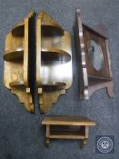 Three oak wall shelves together with a mirrored corner cabinet