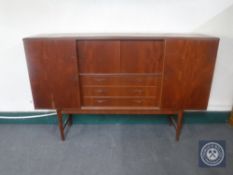 A mid 20th century Danish teak sliding door sideboard