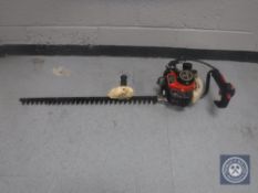 A Kawasaki TF22 petrol hedge trimmer