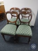 A set of four Victorian mahogany balloon back chairs
