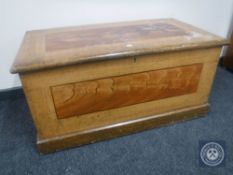 An antique pine blanket box