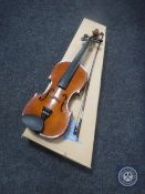 A boxed Stentor student violin and bow