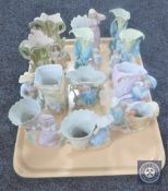 A tray of twelve continental bisque vases